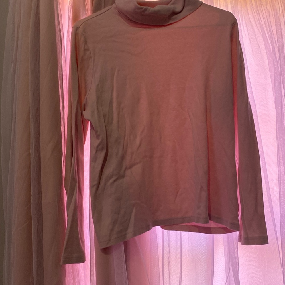 Pink turtleneck